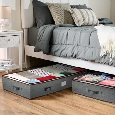 Low profile under-bed storage containers with transparent view windows neatly organized beneath a modern wooden bed frame