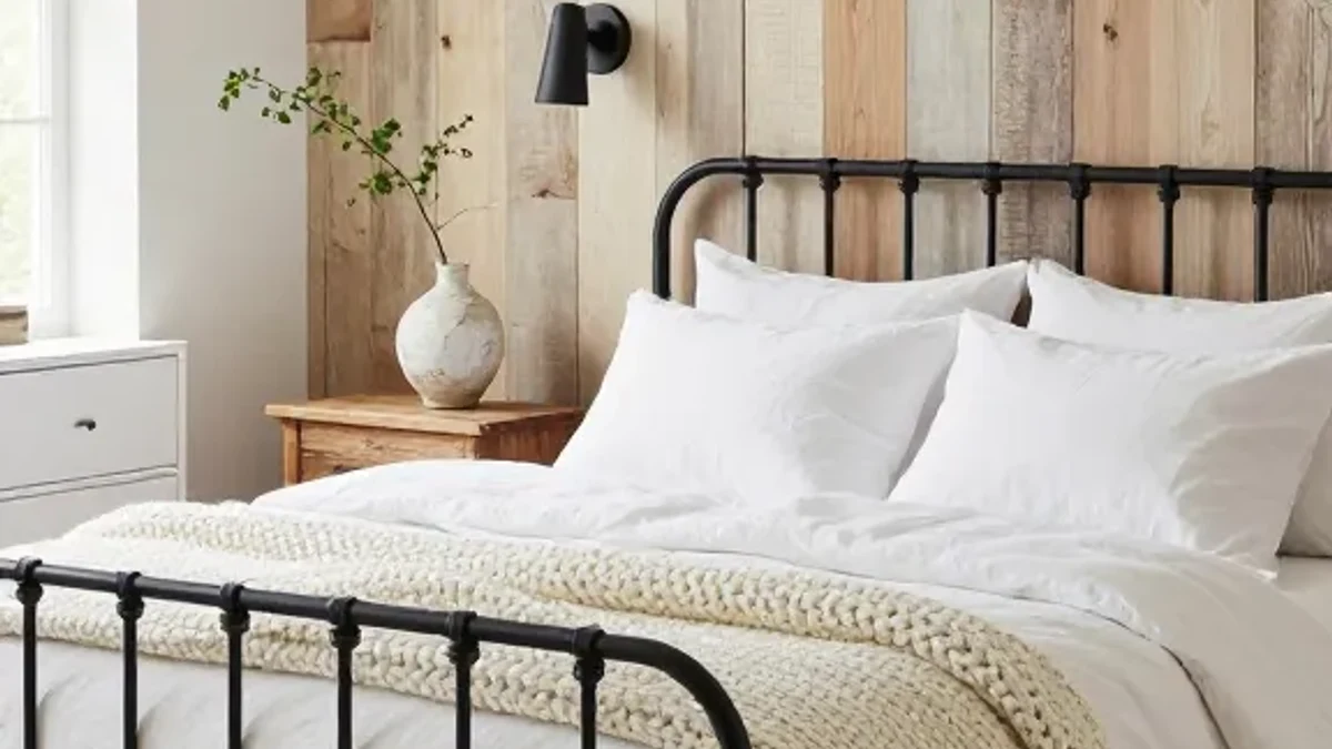 A black wood sleigh bed frame for classic drama