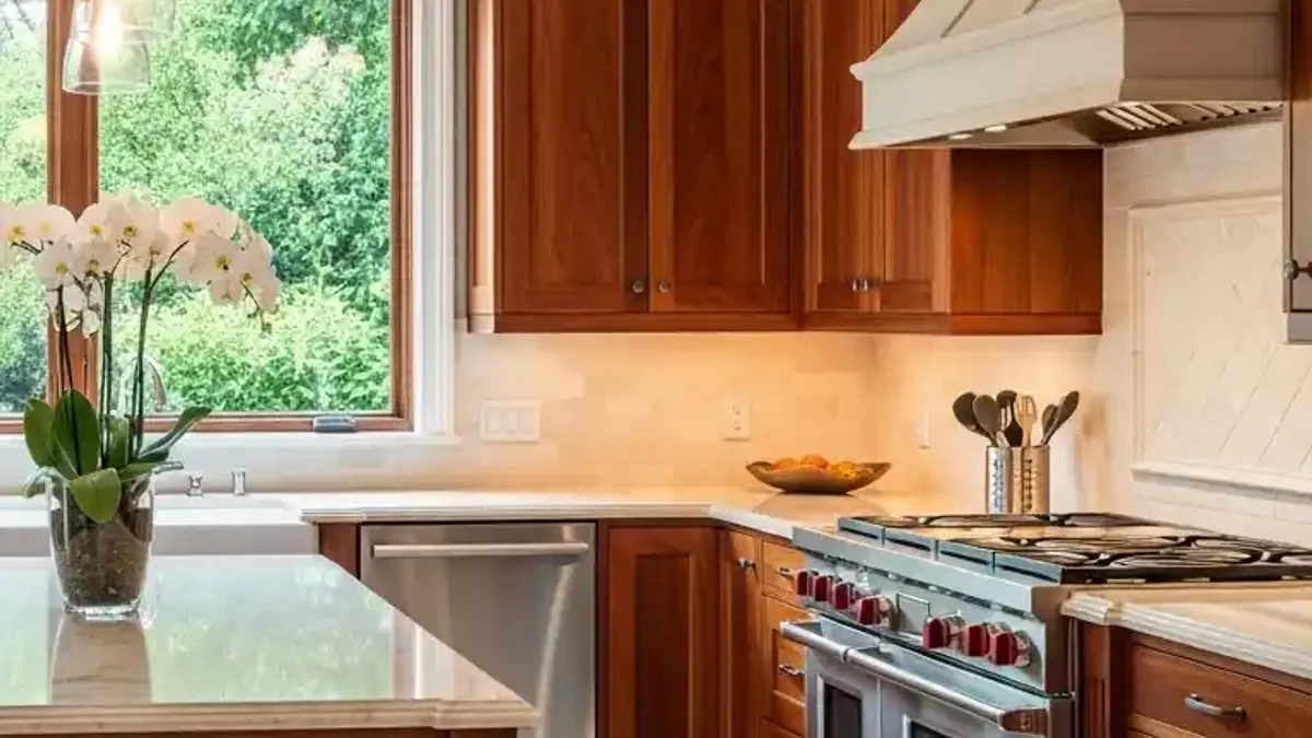 Rich Mahogany kitchen cabinetry in a classic formal kitchen layout