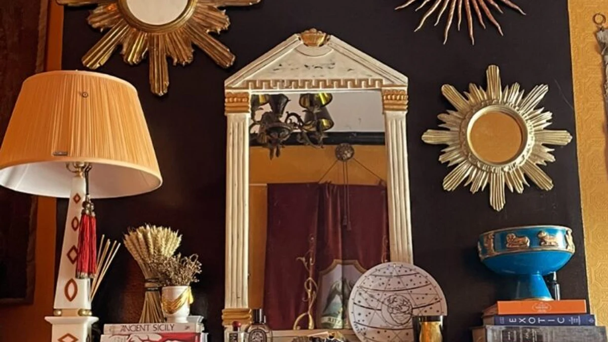 A gallery of mirrors in varying shapes and sizes