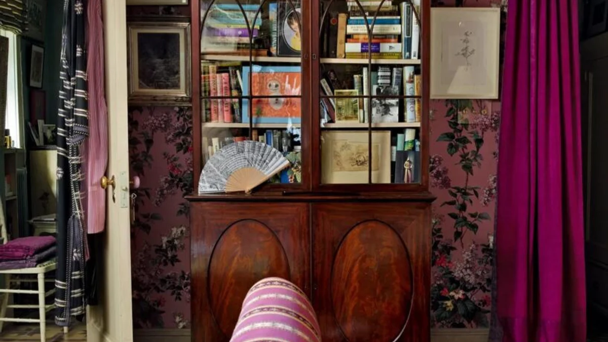 Curating a dense, layered bookshelf display