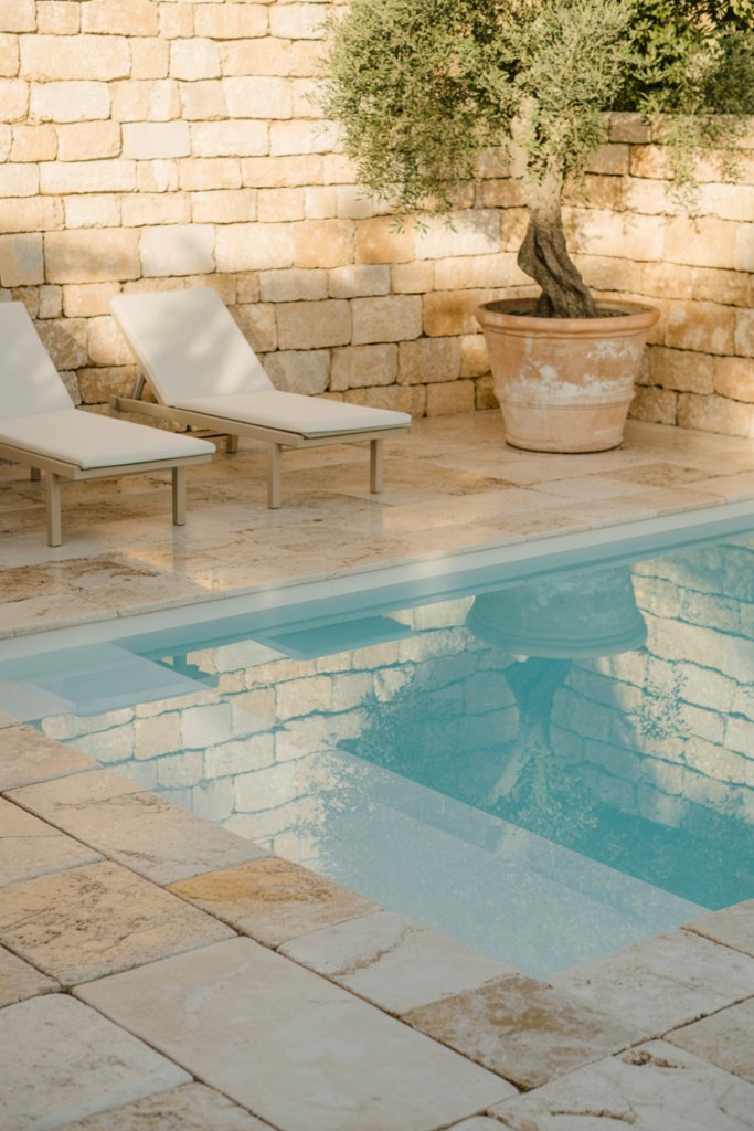 13. A Natural Stone-Surround Plunge Pool for Timeless Organic Elegance