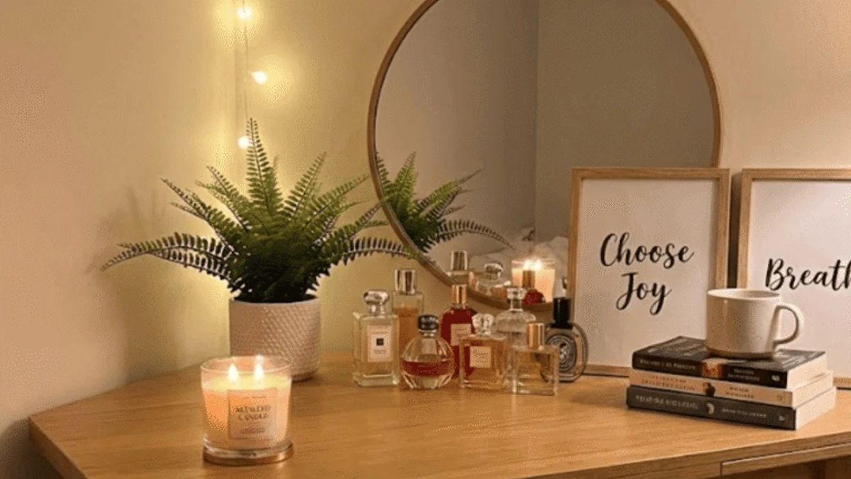 A vanity styled with a curated perfume and jewelry display