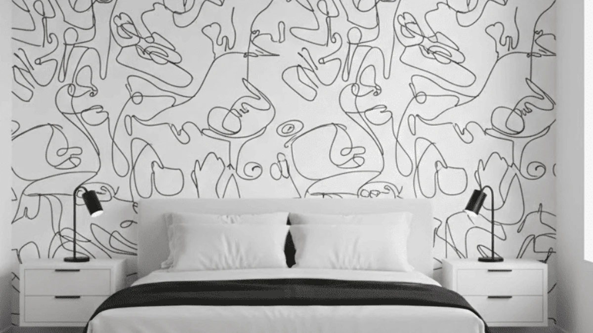 A wallpaper accent wall limited to just the headboard nook