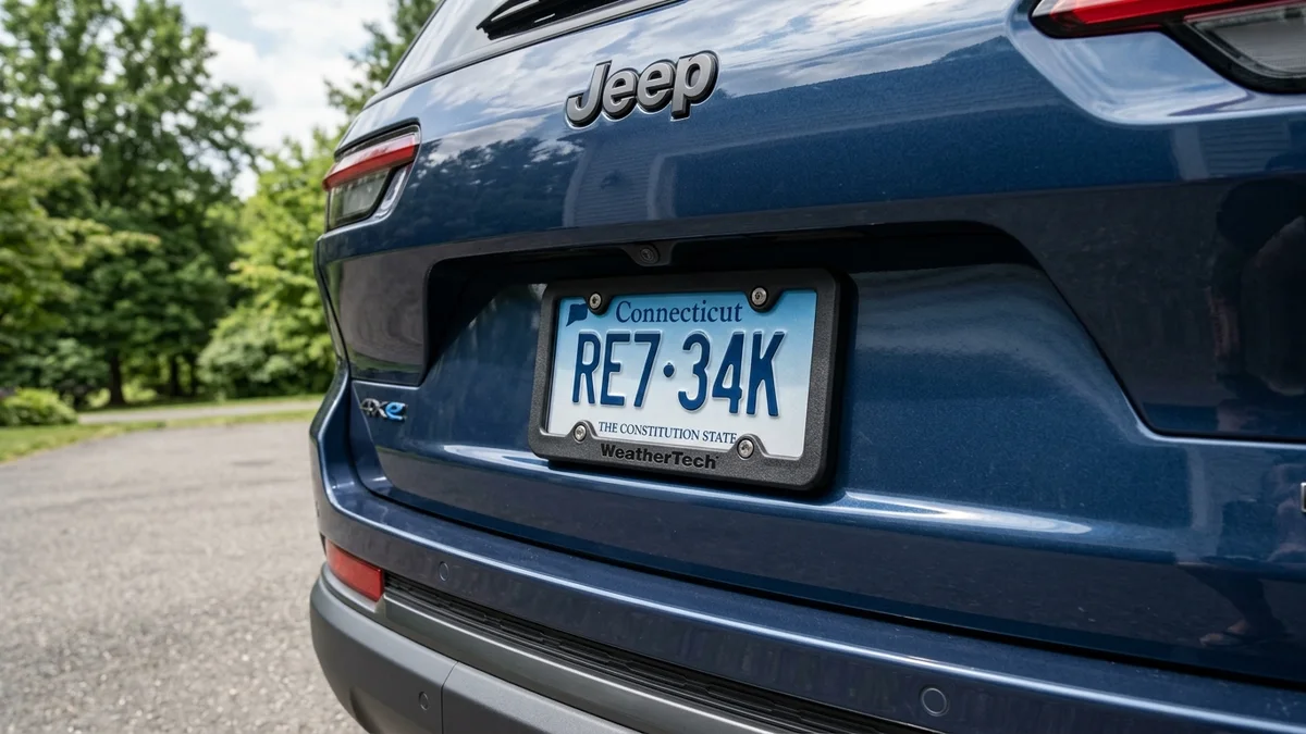 WeatherTech black license plate frame installed on vehicle