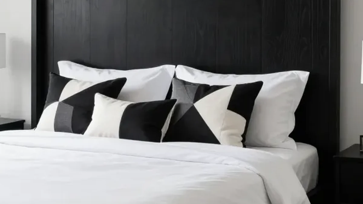 A dark ebony-stained wood frame for dramatic contrast