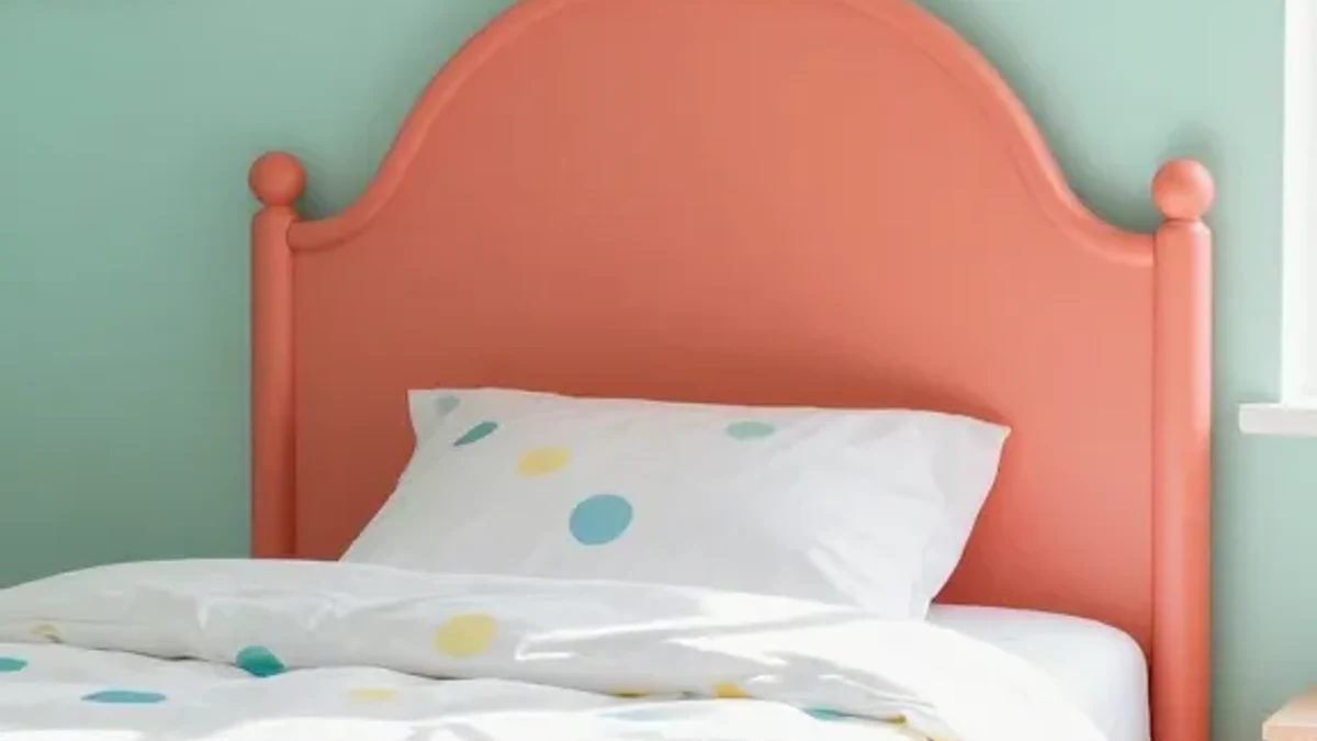 A rounded, organic-shaped wood headboard